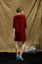 Velvet shift dress with half sleeves and contrast bow detail for elegant day-to-night wear